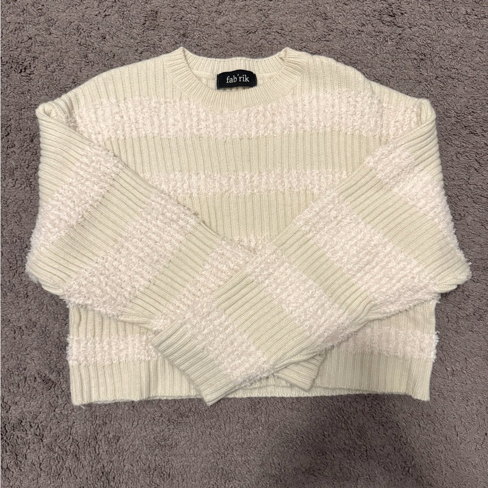 Knitted pattern sweater.